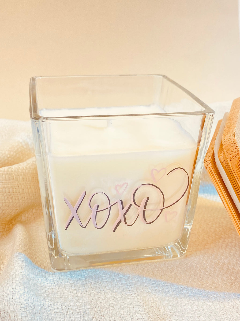Natural Soy Wax Candle 9oz Customizable in a glass vessel with XOXO design and heart accents.