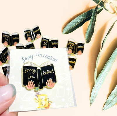Bookish enamel pin black and gold