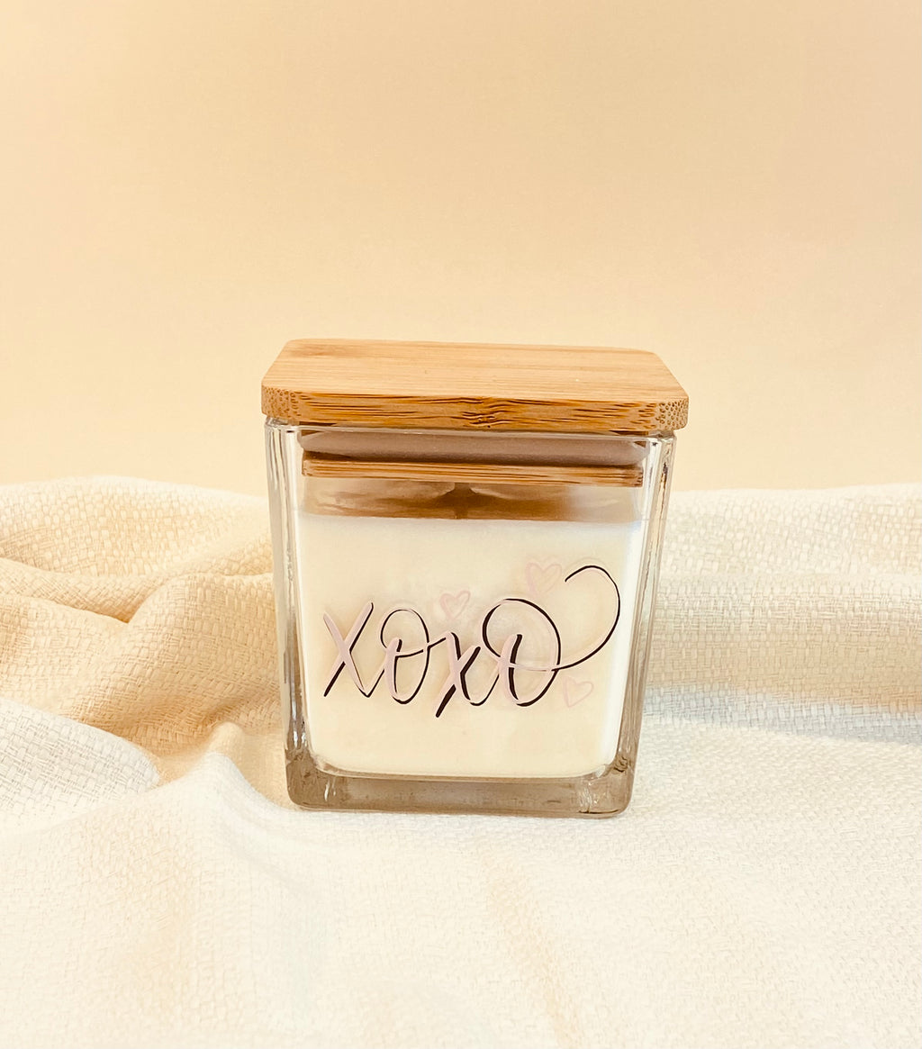 Natural Soy Wax Candle 9oz Customizable with rose-toned script and wood lid, perfect for special occasions.