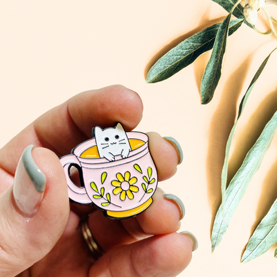 Cute Kawaii cat enamel pin in teacup, pink and green