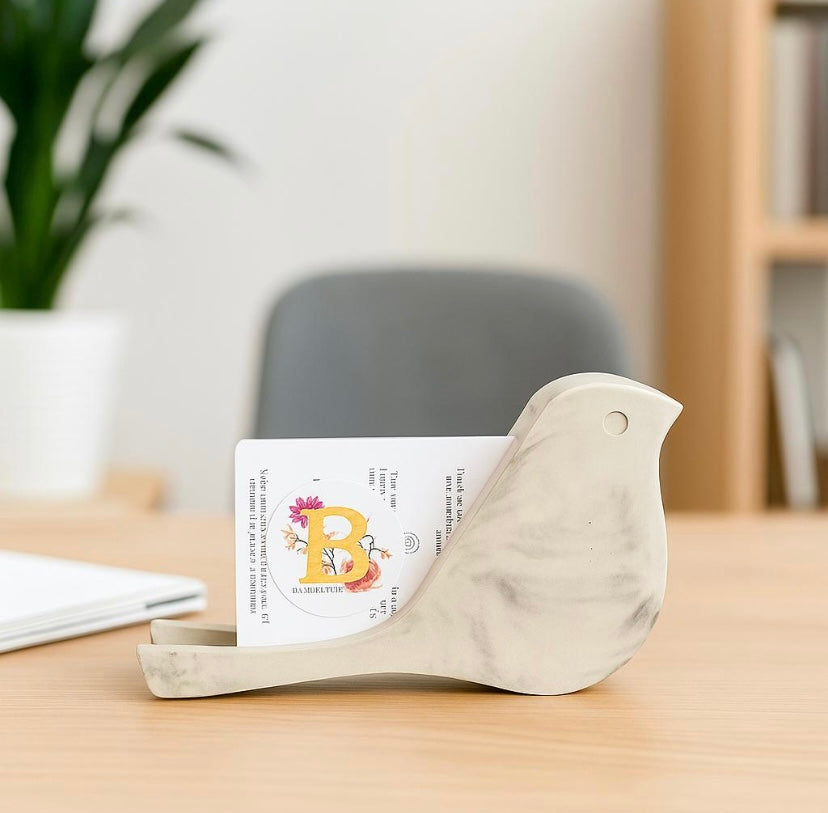 Decorative Concrete bird business card holder sitting on a desk