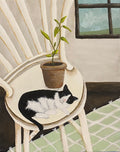 Art for Cat Lovers: Cozy Cat Painting of a black and white cat sleeping on a chair with a plant.