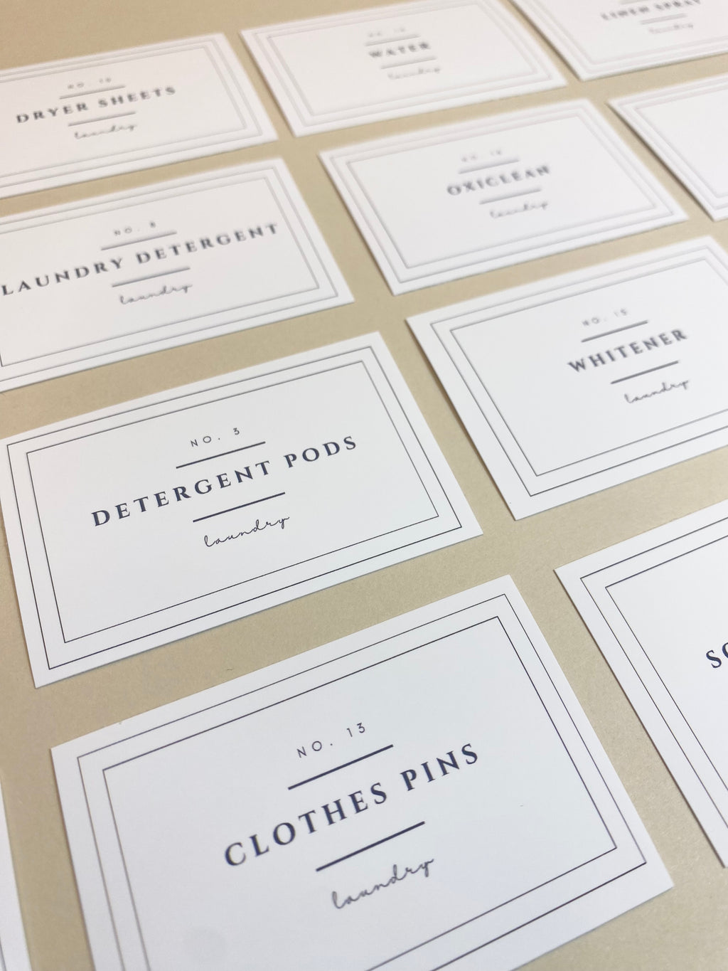 Close-up of minimalist laundry label design, matte vinyl water resistant, clean modern typography