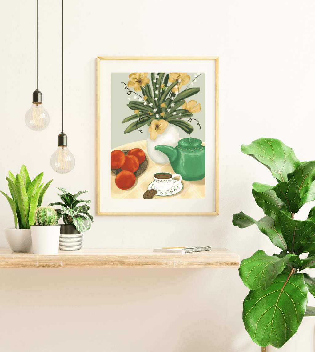 Still Life Print-Flowers Fruit Tea & Cookie displayed in a cozy home setting with plants and decorative elements.