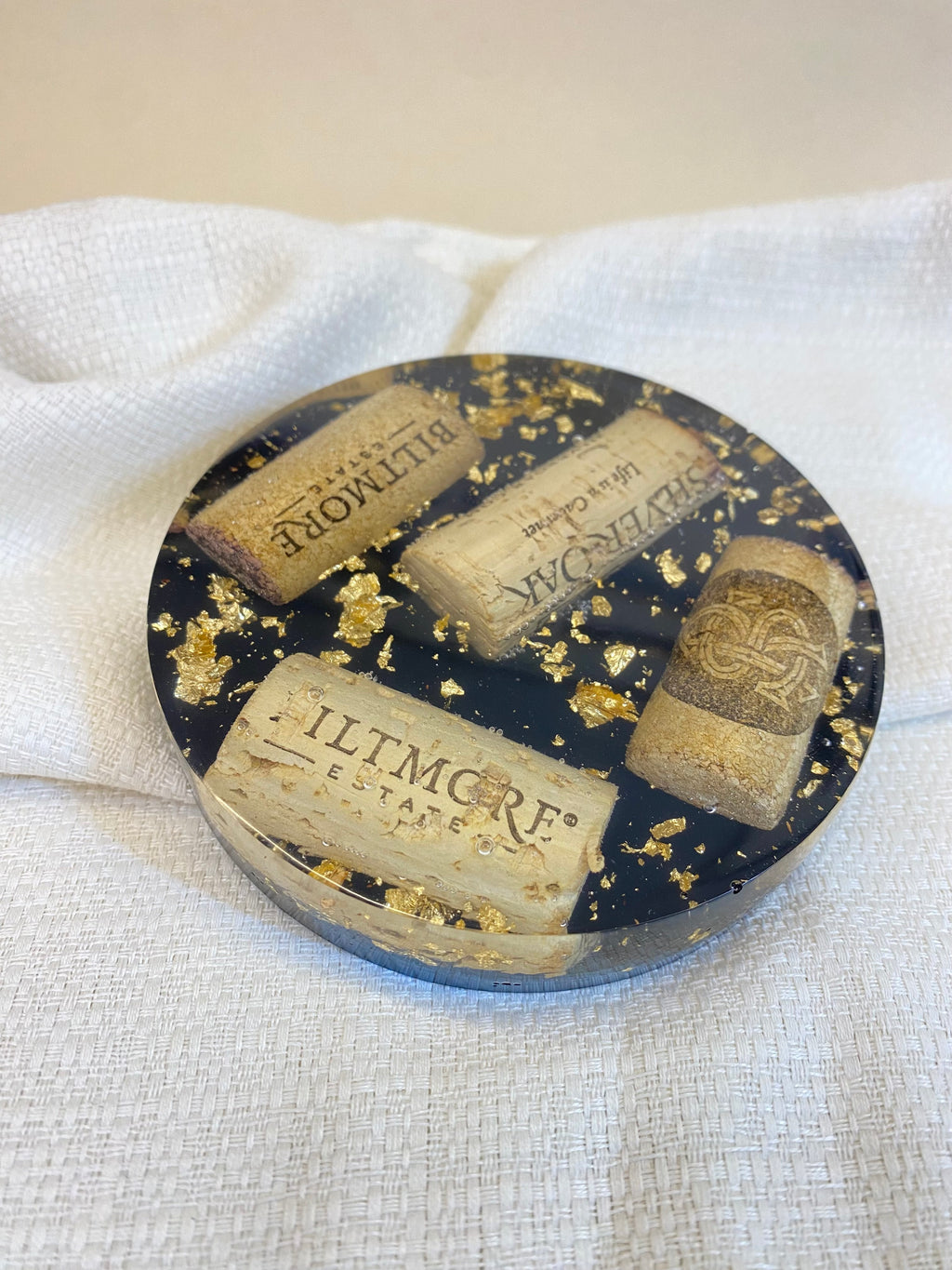 Handmade wine lover gifts wine cork resin coaster with gold accents and rustic design.