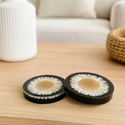 Stylish flower resin coasters featuring real strawflowers in glossy black, perfect for home decor and gifting.