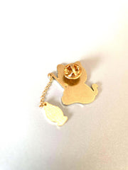 Adorable cat fishing enamel pin charm with gold details, perfect for jackets, hats, and purses.