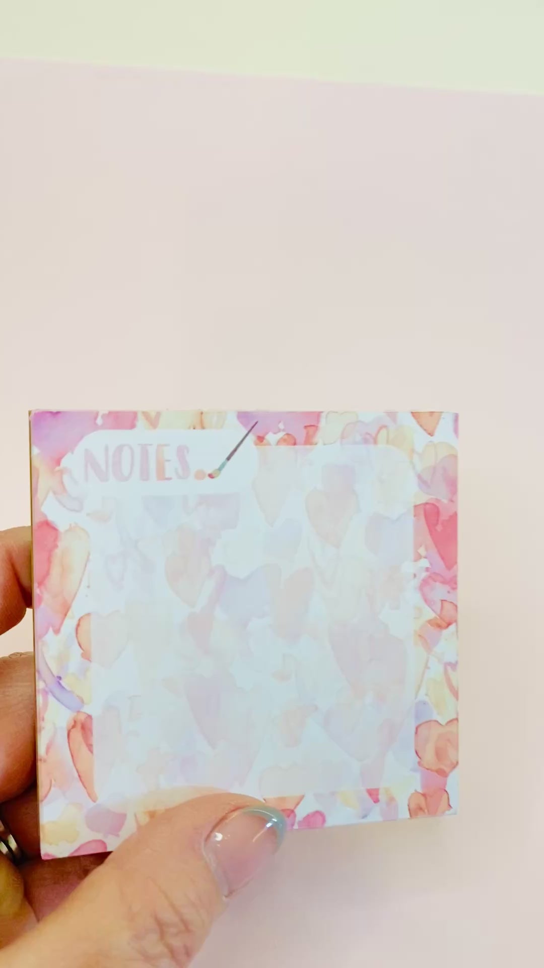 video of a heart memo pad